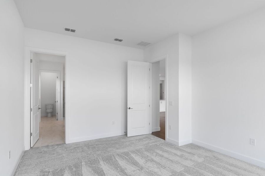 Representative unfurnished interior of a home built from the Ambra by Taylor Morrison in Esplanade at Center Lake Ranch, St. Cloud (Image 28).
