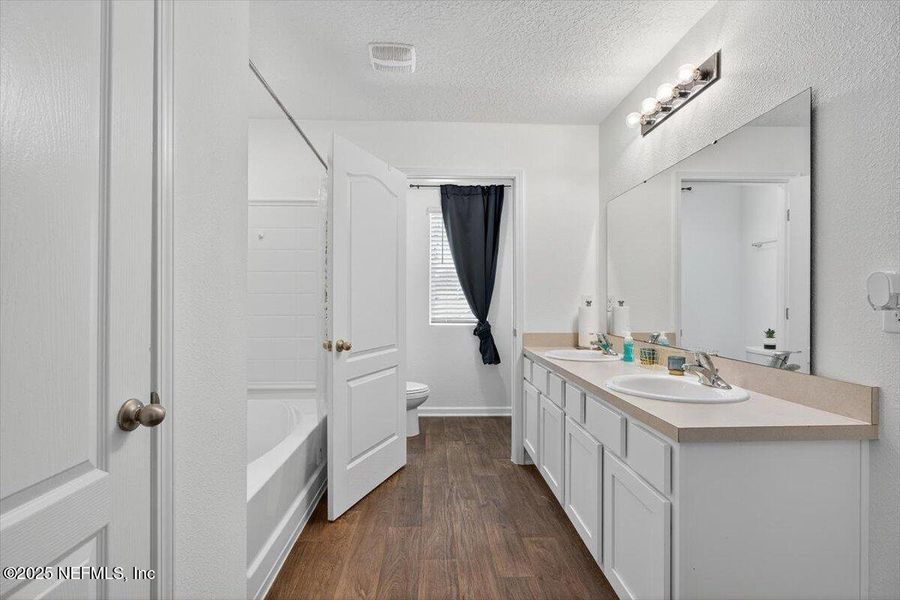 Furnished interior view inside a new home in River Glen Express, Yulee (Image 6).
