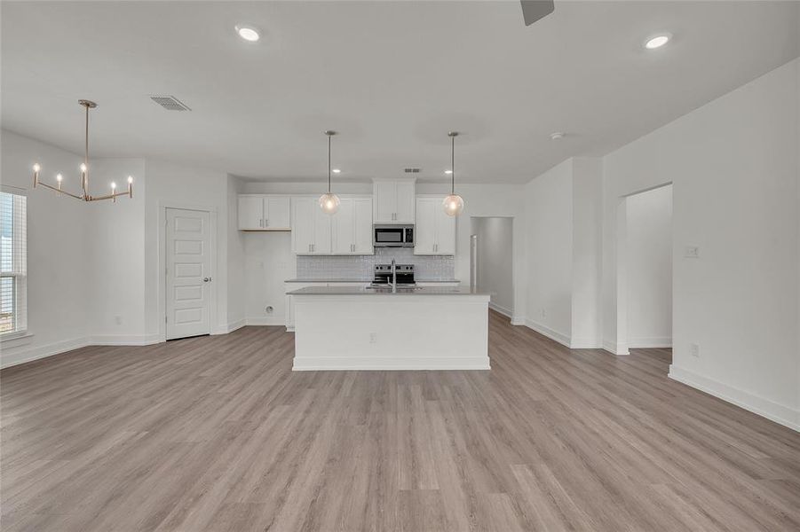 Please Note: These interior photos are not of the actual home but are of a completed one with a similar floor plan. Finishes, features, and layouts may vary.