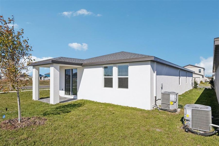 Exterior details and patio area of a home in Crosswinds - Classic Series, Haines City (Image 23).