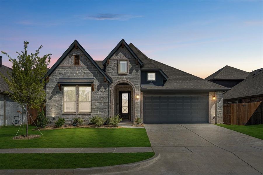 Front exterior of a new home in Ridge Ranch Classic 50, Mesquite, TX, highlighting curb appeal (Image 1). Front exterior of a new home in Ridge Ranch Classic 50, Mesquite, TX, highlighting curb appeal (Image 1).