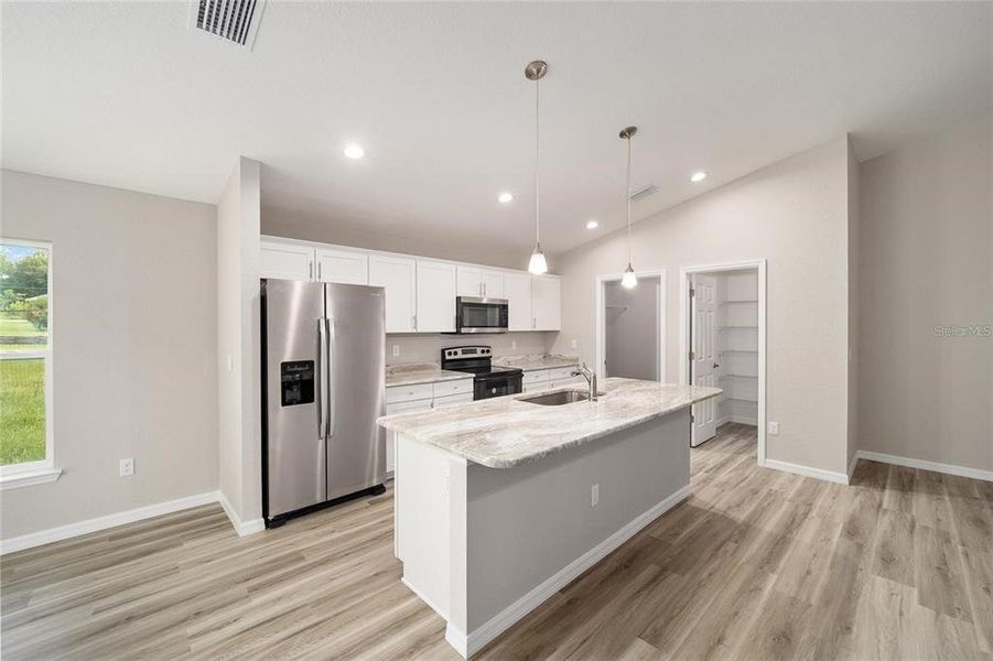 Furnished interior view inside a new home in , Summerfield (Image 11).
