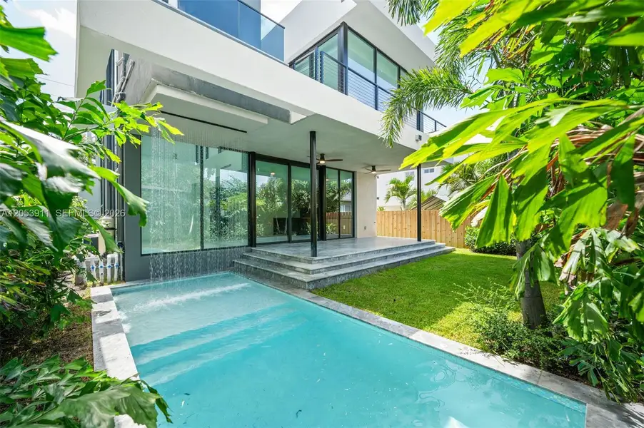 Exterior details and patio area of a home in , Miami (Image 25). Exterior details and patio area of a home in , Miami (Image 25).