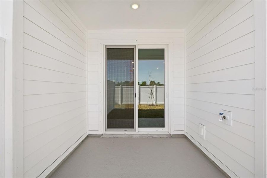 Exterior details and patio area of a home in Montague Chase, Tampa (Image 8).