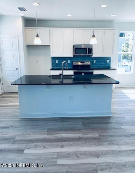 Furnished interior view inside a new home in , Jacksonville (Image 2).