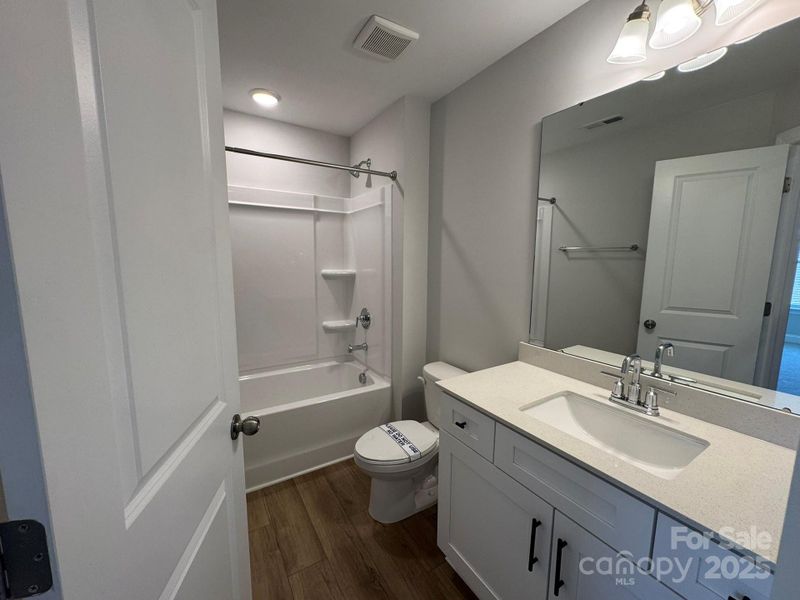 Furnished interior view inside a new home in Harrisburg Village, Harrisburg (Image 1).