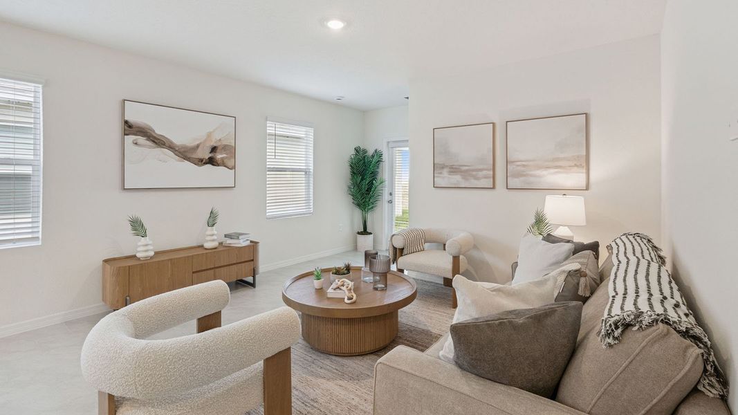 Representative furnished interior of a home built from the Downing II by D.R. Horton in Villamar, Winter Haven (Image 8).