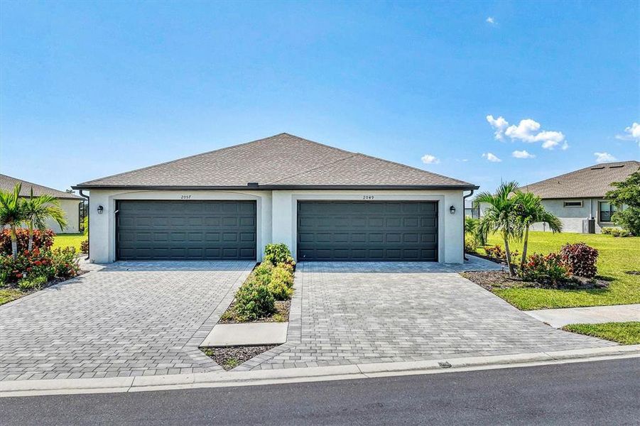 Front exterior of a new home in , Port Charlotte, FL, highlighting curb appeal (Image 19).