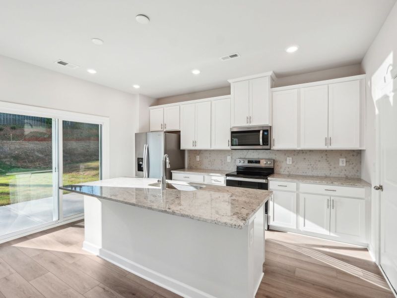 Furnished interior view inside a new home in Walnut Reserve, Conover (Image 5).
