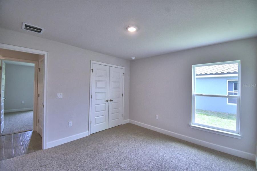 Spacious, unfurnished interior of a new home in Lake Juliana Estates, Auburndale (Image 44).