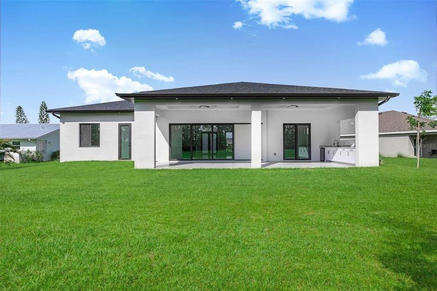 Front exterior of a new home in , Punta Gorda, FL, highlighting curb appeal (Image 19).