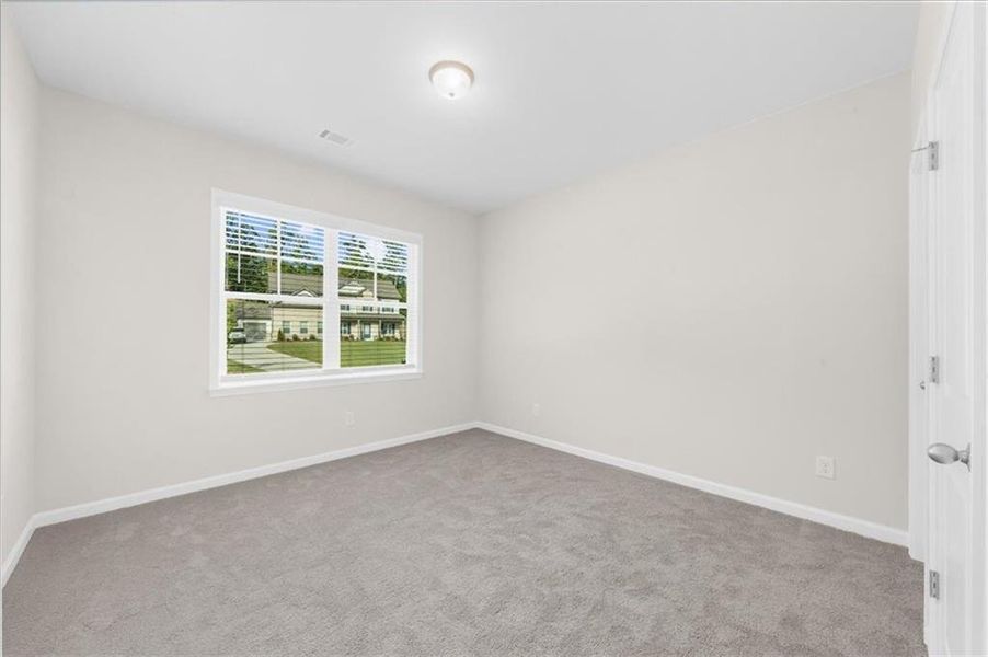 Spacious, unfurnished interior of a new home in River Rock, Ball Ground (Image 21).