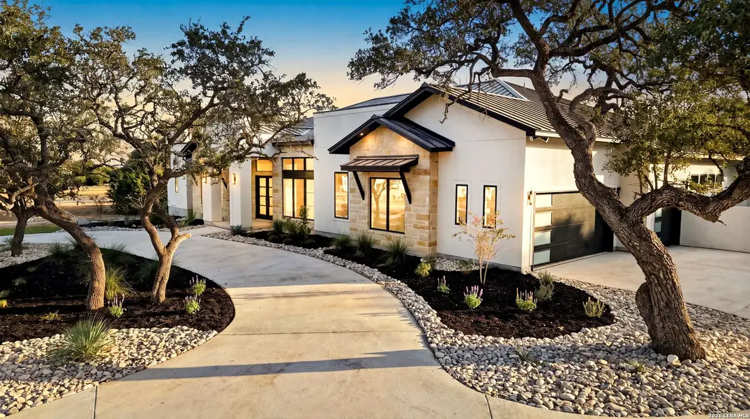 Front exterior of a new home in , Fair Oaks Ranch, TX, highlighting curb appeal (Image 2). Front exterior of a new home in , Fair Oaks Ranch, TX, highlighting curb appeal (Image 2).