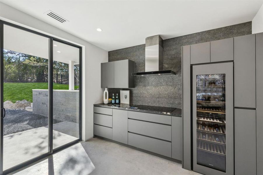 Catering Kitchen with Wine fridge. Additional Wine storage room option.