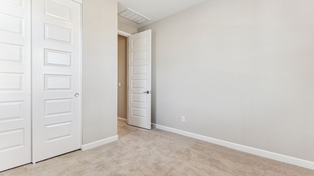 Spacious, unfurnished interior of a new home in Talinn Towns at Desert Ridge, Phoenix (Image 17).