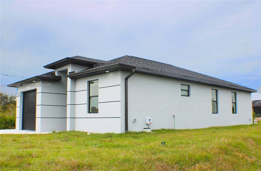 Exterior details and patio area of a home in , Lehigh Acres (Image 3).