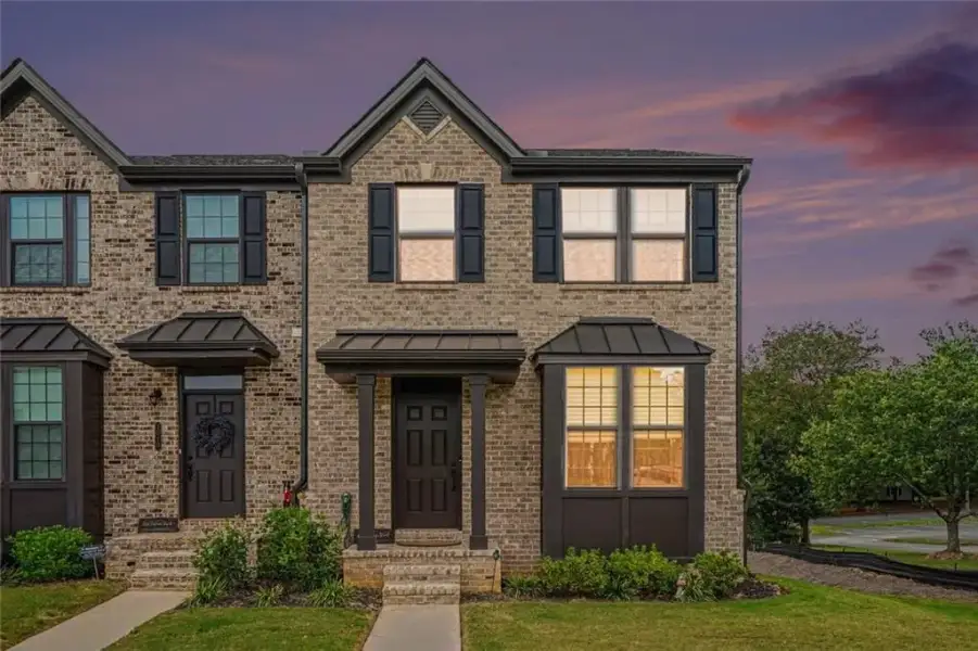 Front exterior of a new home in , Lawrenceville, GA, highlighting curb appeal (Image 26).