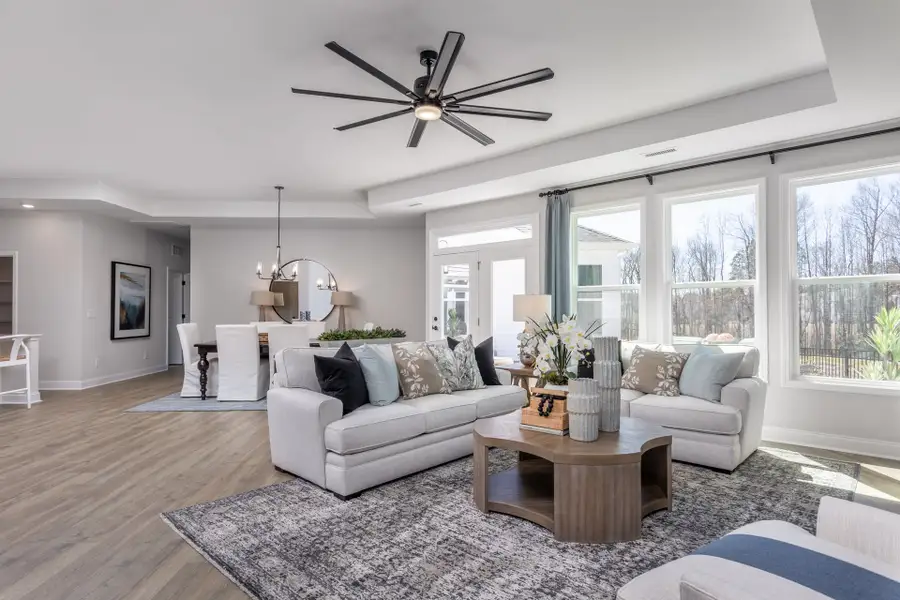 Representative furnished interior of a home built from the Promenade by McKee Homes in The Cottages at 78 North, Sanford (Image 6).