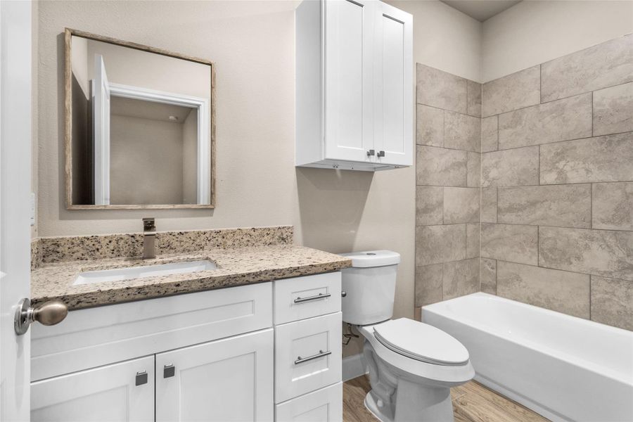 Furnished interior view inside a new home in , Willis (Image 9).