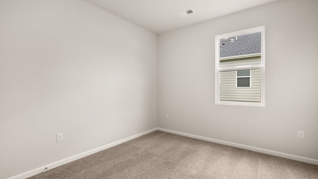 Spacious, unfurnished interior of a new home in Preserve at Dove Creek, Statham (Image 28).