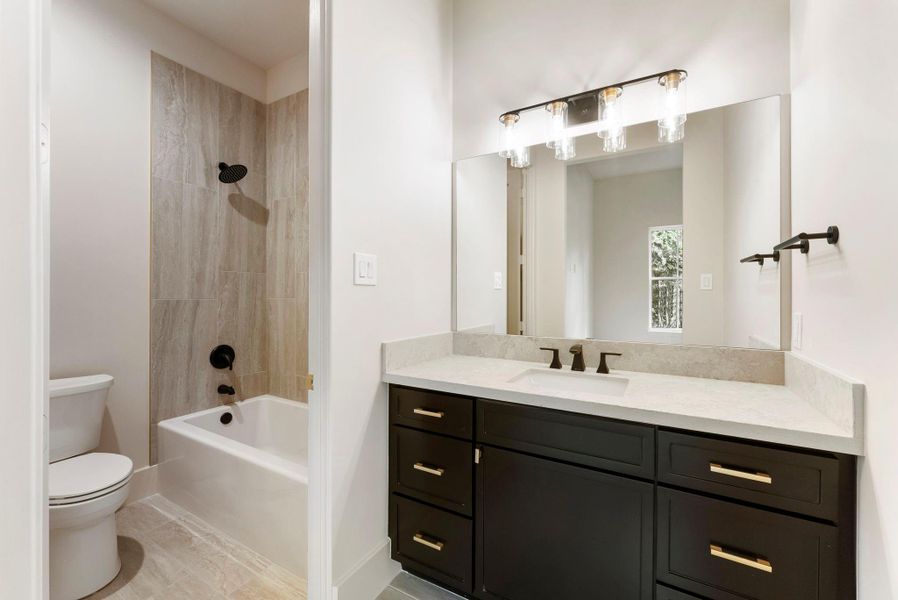 Furnished interior view inside a new home in , New Waverly (Image 6). Furnished interior view inside a new home in , New Waverly (Image 6).