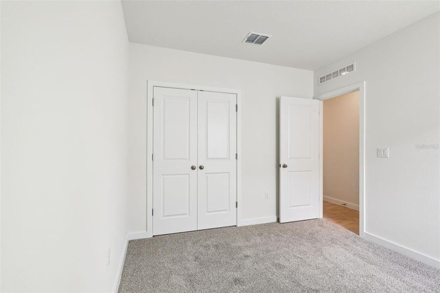 Spacious, unfurnished interior of a new home in Willowbrook North, Winter Haven (Image 28).