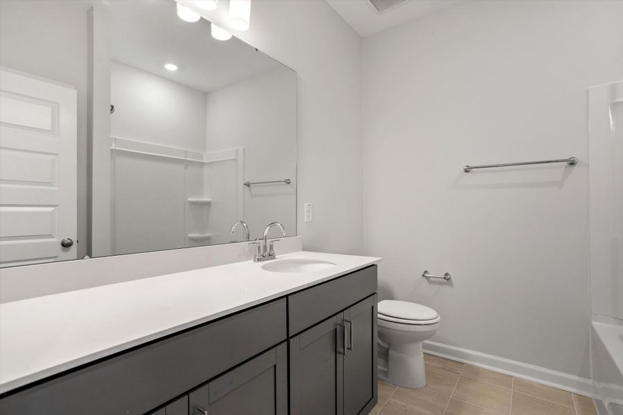 Furnished interior view inside a new home in Ovation at Sweetbrier, Durham (Image 12).