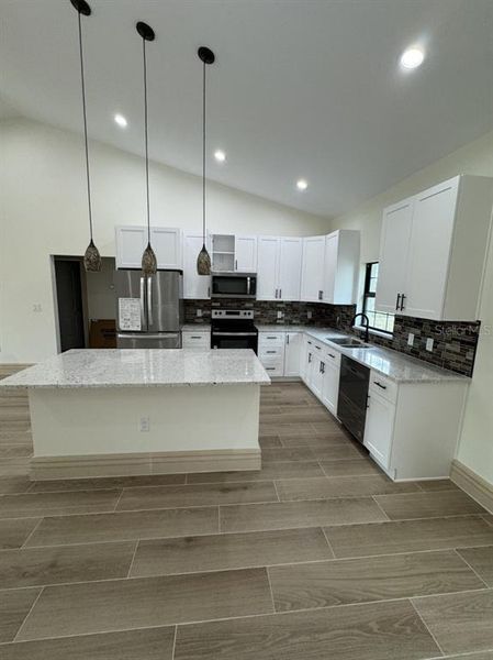 Furnished interior view inside a new home in , Okeechobee (Image 8).