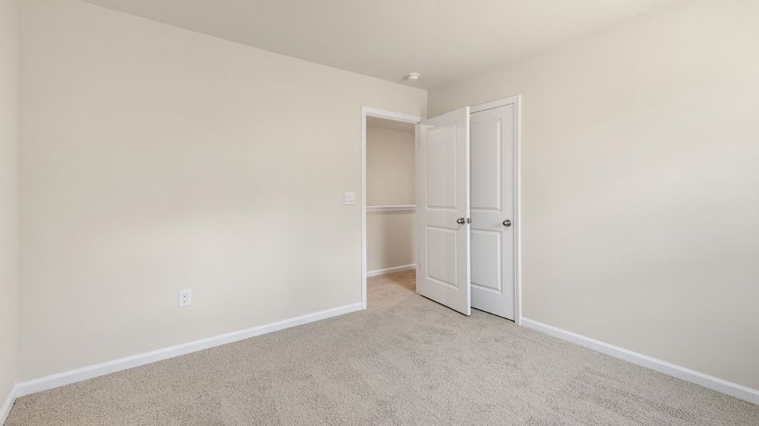 Spacious, unfurnished interior of a new home in Villa Grande, Winterville (Image 31).