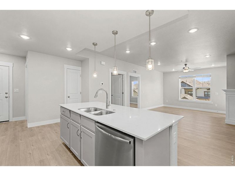 Furnished interior view inside a new home in Highlands at Fox Hill - The Flats, Longmont (Image 5).