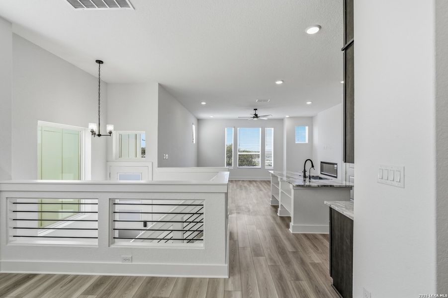 Furnished interior view inside a new home in Rose Hill, San Antonio (Image 13).