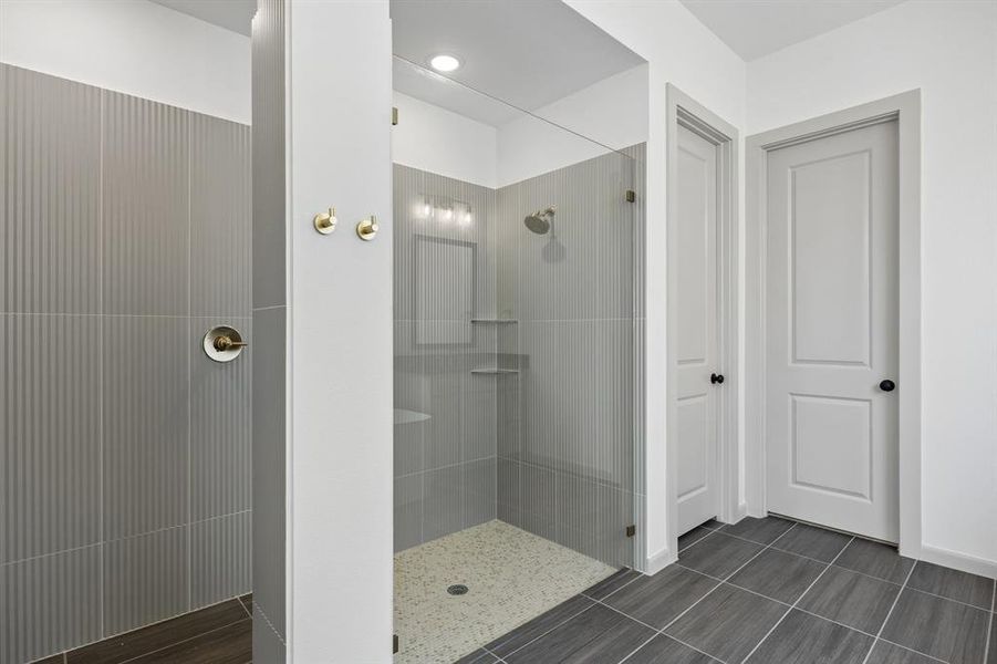This spacious walk in shower with drying area is only one fantastic feature in this dream owner's bath! This spacious walk in shower with drying area is only one fantastic feature in this dream owner's bath!