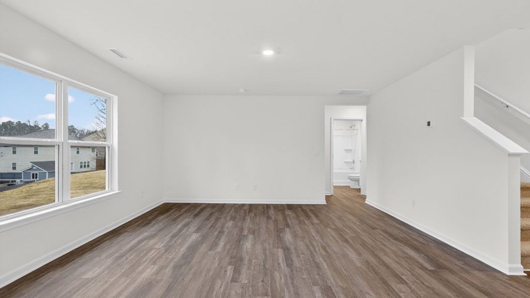 Representative unfurnished interior of a home built from the Hayden by D.R. Horton in Mangum Farms, Stem (Image 13).