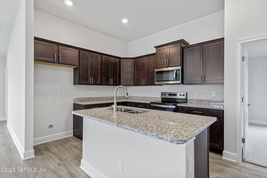 Furnished interior view inside a new home in Shadow Crest at Rolling Hills, Green Cove Springs (Image 5). Furnished interior view inside a new home in Shadow Crest at Rolling Hills, Green Cove Springs (Image 5).