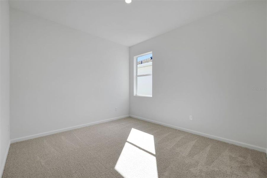 Spacious, unfurnished interior of a new home in Brystol North at Wylder, Port St. Lucie (Image 13).