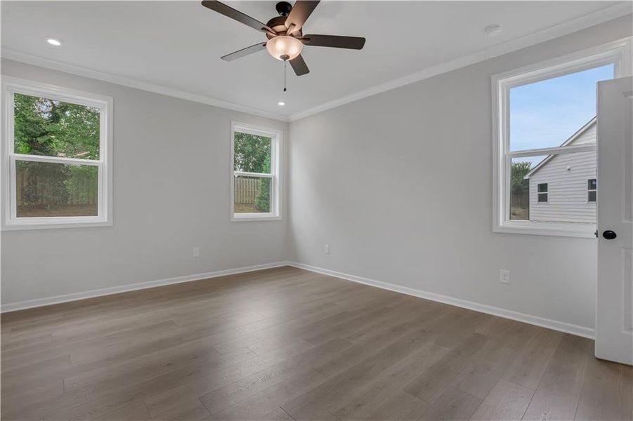 Spacious, unfurnished interior of a new home in The Paddocks at Doc Hughes, Buford (Image 41).