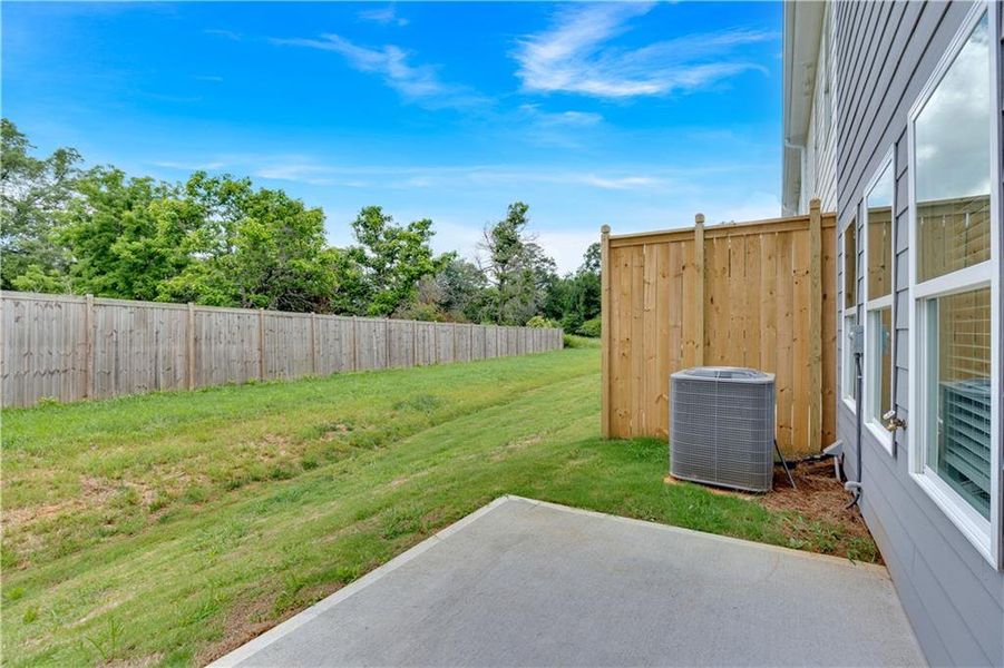 Exterior details and patio area of a home in Village Green, Adairsville (Image 3).