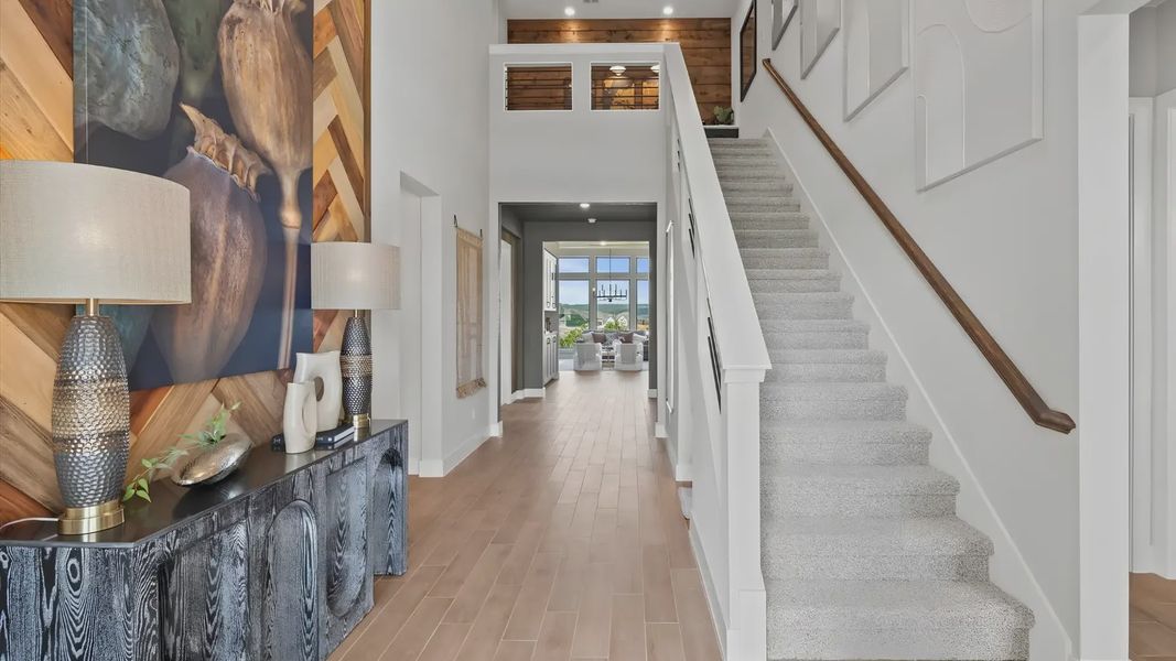 Representative furnished interior of a home built from the Melody by Chesmar Homes in Newhaven, Manor (Image 3).