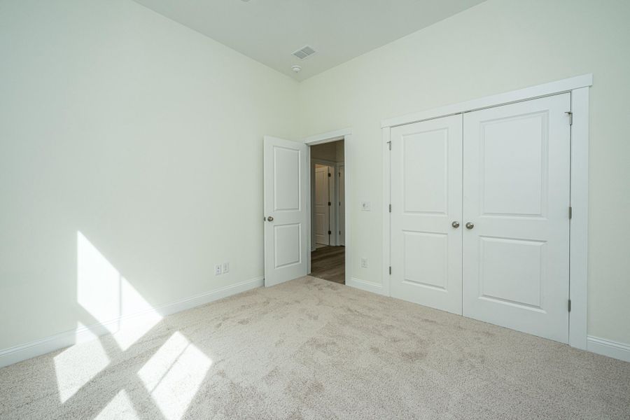 Spacious, unfurnished interior of a new home in , Awendaw (Image 38).