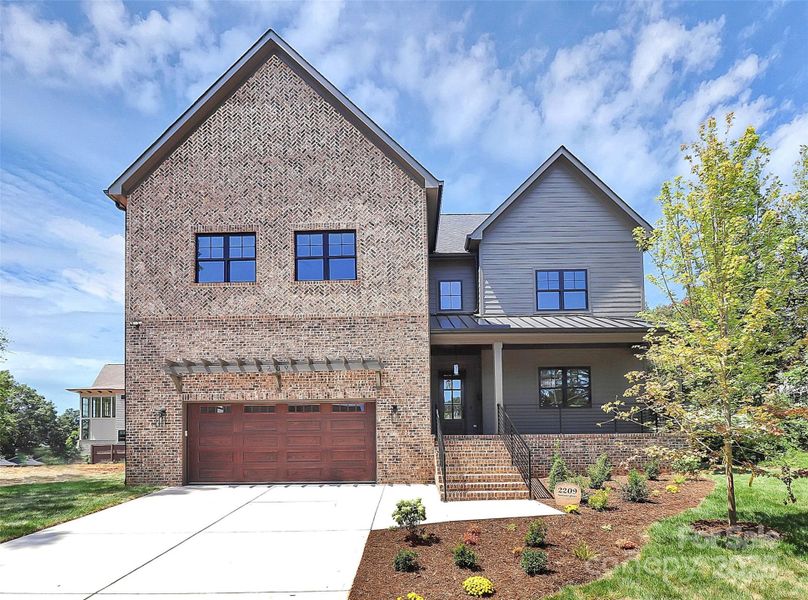 Front exterior of a new home in , Charlotte, NC, highlighting curb appeal (Image 26).