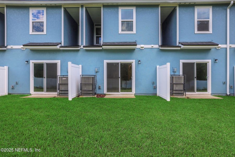 Front exterior of a new home in Kasen Oaks, Jacksonville, FL, highlighting curb appeal (Image 18).