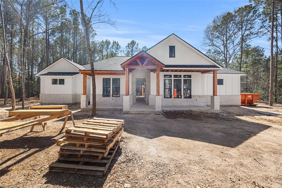 Welcome to 28065 Palomino Dr.  Striking modern farmhouse on 1.6 acre corner lot with covered front porch