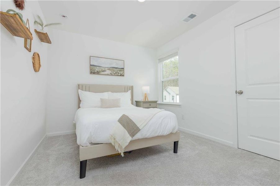 Furnished interior view inside a new home in Creekside at Farmers Crossing, Ball Ground (Image 31).