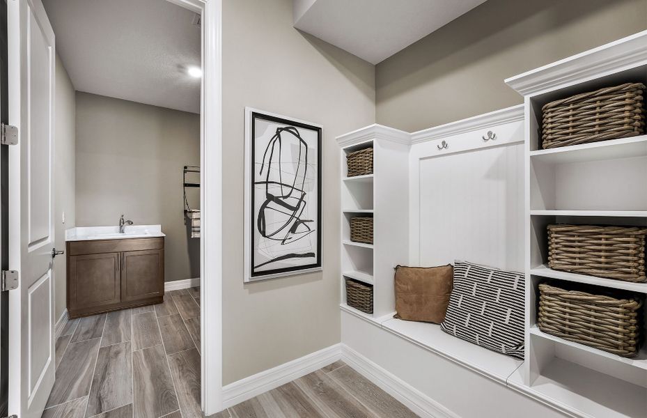 Representative furnished interior of a home built from the Easley by DiVosta in Emerson Oaks, Vero Beach (Image 6).