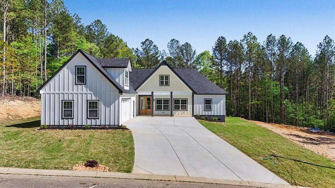 Front exterior of a new home in , Lindale, GA, highlighting curb appeal (Image 25).