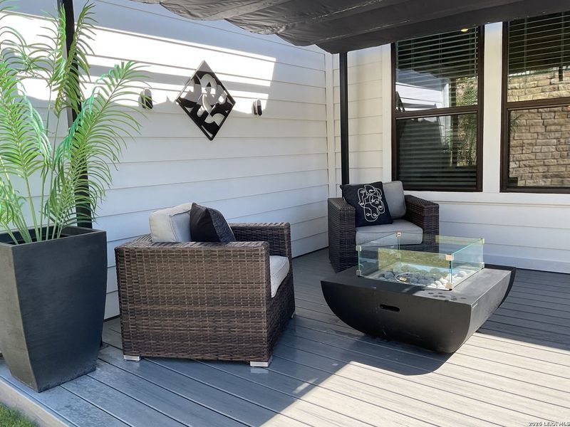 Exterior details and patio area of a home in Kissing Tree, San Marcos (Image 24).