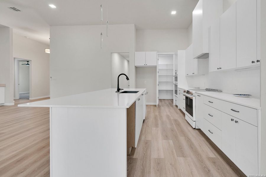 Furnished interior view inside a new home in , Fischer (Image 12).