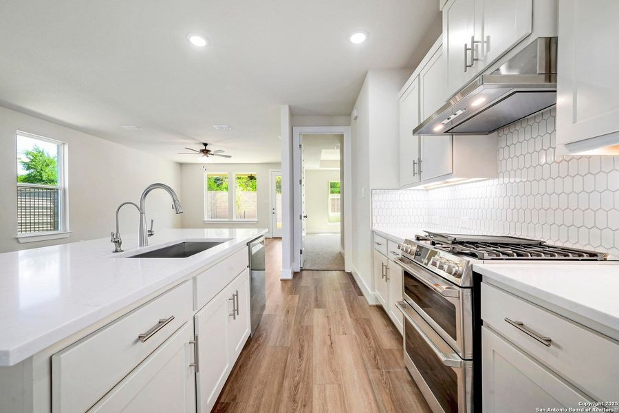 Furnished interior view inside a new home in Crown Ridge Manor, San Antonio (Image 7).