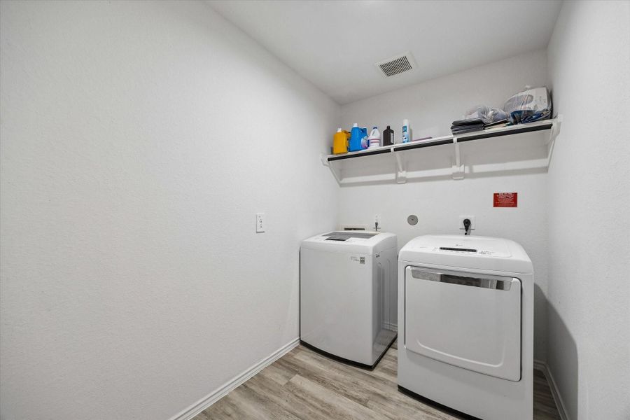 Furnished interior view inside a new home in Tamarron, Fulshear (Image 11).