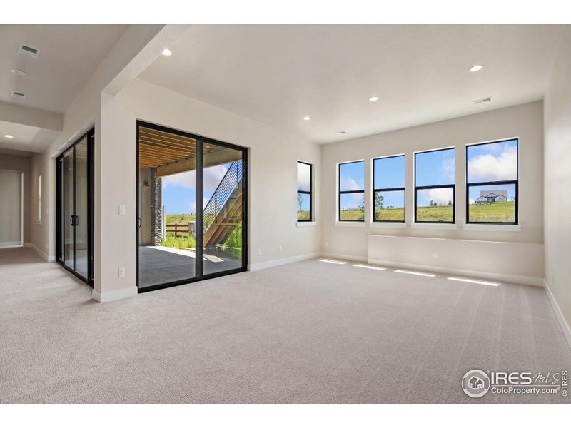 Spacious, unfurnished interior of a new home in The Fairways at RainDance, Windsor (Image 17).